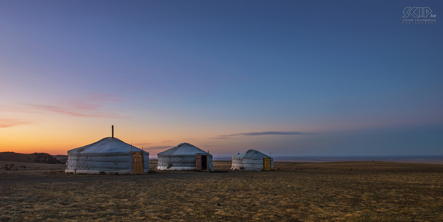 Gobi - Sunset Sunset on the steppe plains of the Gobi desert near the Yolin Am canyon. We stayed in these gers of a nomadic family. A ger (yurt in Russian) is the typical portable bent dwelling of Mongolian nomads. Stefan Cruysberghs